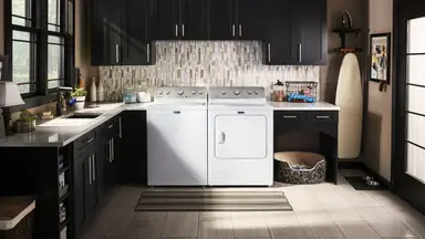 This Maytag washer is a traditional white top-loader.