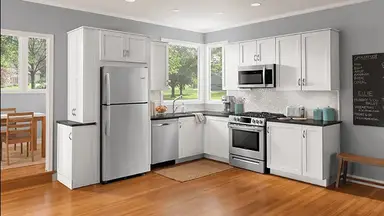 The Frigidaire FFGH3054 range looks beautiful in a modern white kitchen.
