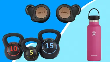 weights, earbuds and pink water bottle on a blue background