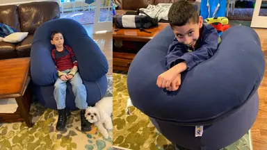 Boy lounges on a Yogibo bean bag.