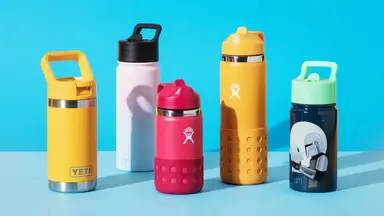 A few of the best water bottles for kids on a blue background.