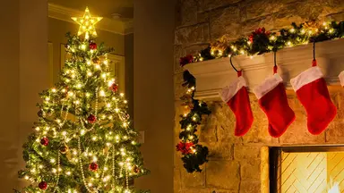 A star tree topper on top of a family's Christmas tree.