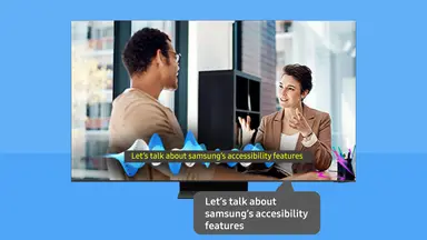 Desktop computer features two people talking with a subtitle caption on screen.
