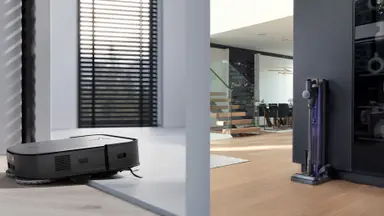 A robot vacuum and cordless vacuum being diaplayed
