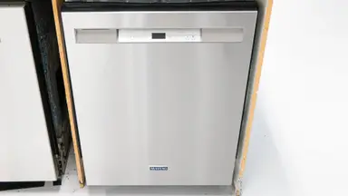 A close-up of the Maytag MDB4949SKZ dishwasher installed in our testing labs.