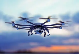 A drone flying in the sky.
