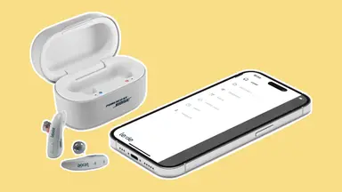Lexie B2 Plus hearing aids pictured next to a smartphone