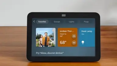 A black Amazon Echo Show 8 sits on a table.