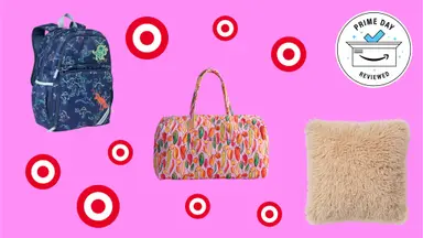 Bags and a pillow with Target logos in front of a pink background