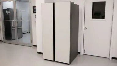 A Samsung Bespoke RS28CB7600 side-by-side refrigerator in the testing lab.