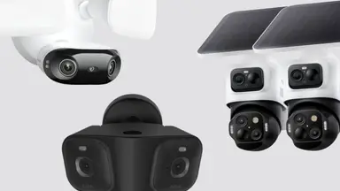 Three large sized security cameras on a gray background