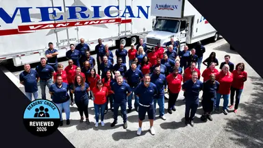 Reviewed's Readers' Choice Award winner badge on top of a group of people in front of a moving van