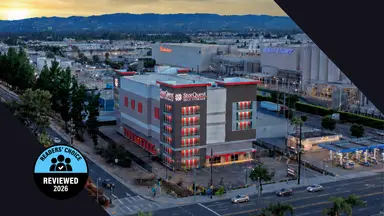 Reviewed's Readers' Choice Award winner badge on top of an image of a large storage building in a city