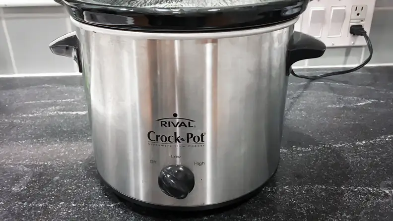 Run the slow cooker on low to clean it