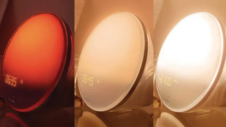 Hand adjusting a Philips Wake-Up Alarm Clock Light