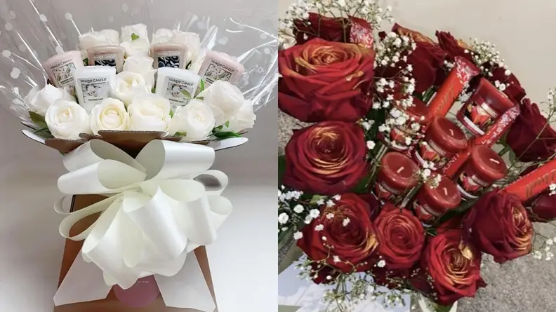 candles and roses in a bouquet with ribbon