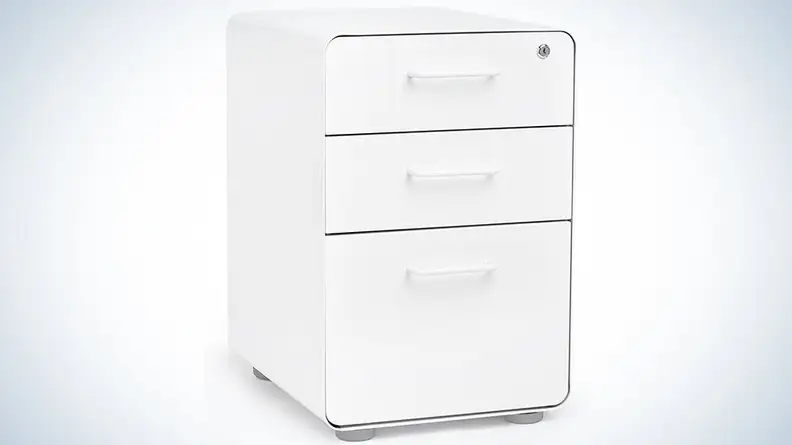 white filing cabinet on faded blue background.