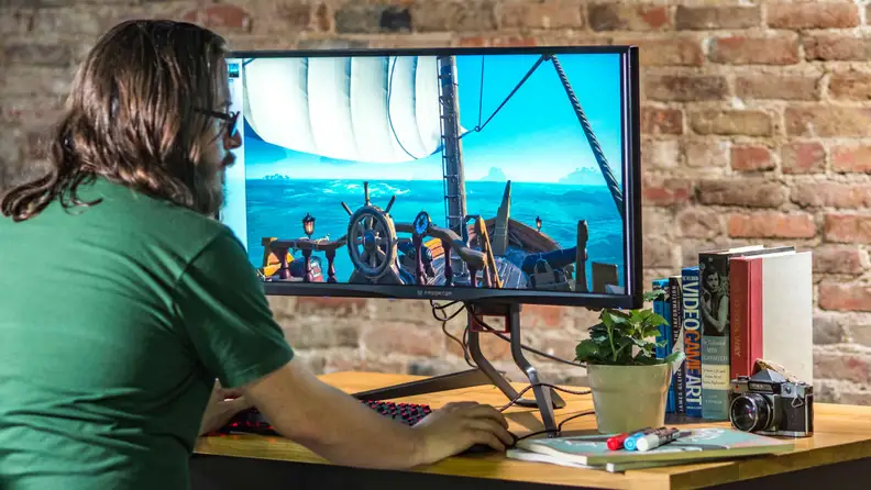 An image of the Acer Predator monitor with a Predator logo screen on the monitor.