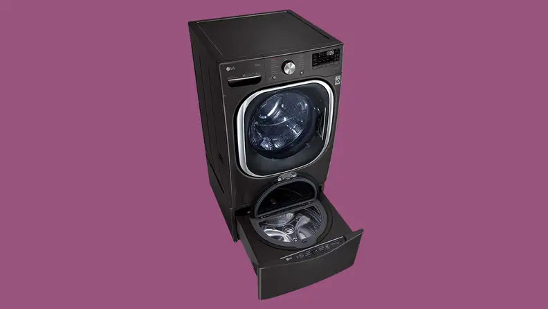 An LG front-load washer ini a white void. We're looking at it from far above, so that we can see down into its pedestal, which conceals a smaller washing compartment.