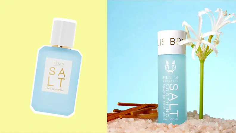 On left, glass bottle of perfume. On right, bottle of body oil next to plant.
