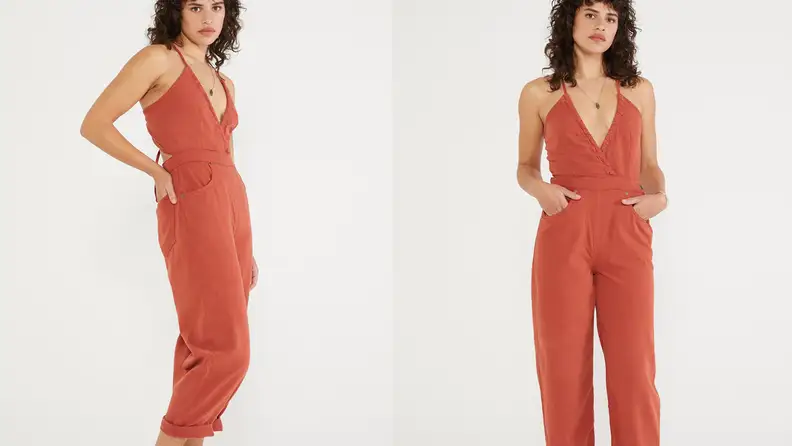 woman wearing copper one piece jumpsuit