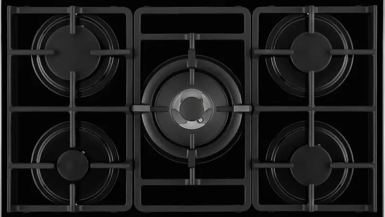 A five-burner gas cooktop show from above.