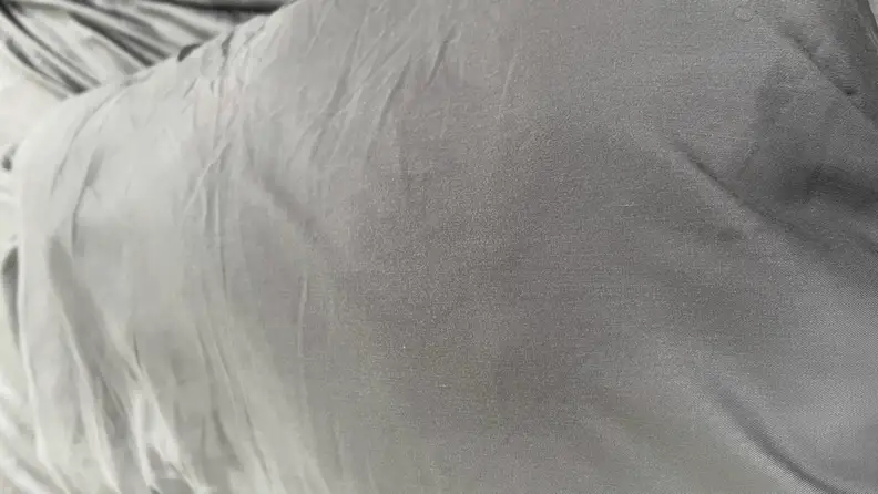 Dark sweat stains on the gray Bedsure Cooling fitted Sheet.