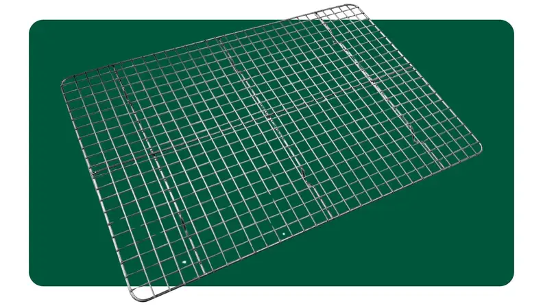 Wire rack on a green background