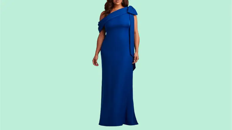 A model wearing a blue one-shoulder gown.
