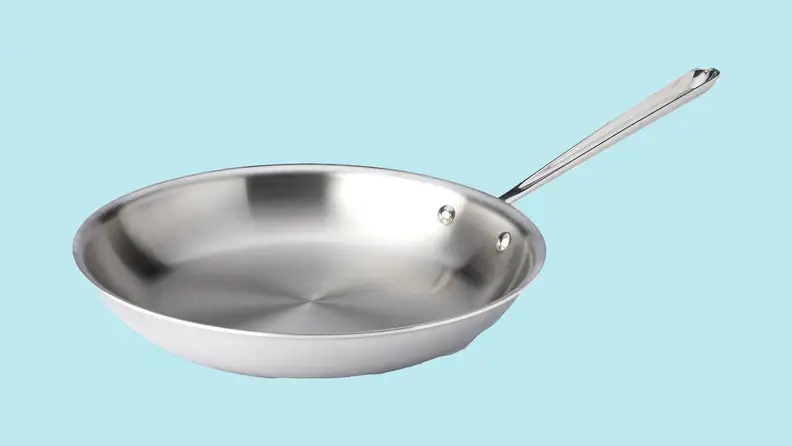 An All-Clad frying pan against a blue background.