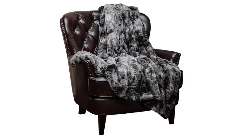 A luxurious throw blanket will make you feel cozy when you're taking some restorative time.