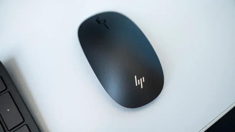 An overhead of the included wireless mouse