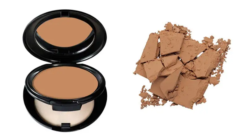 On the left, the Cover FX Pressed Mineral Foundation compact sits open on a white background to expose a tan-colored powder, a mirror, and a sponge applicator. On the right, a tan-colored powder is crushed up on a white background.
