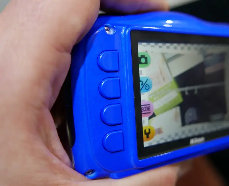 The four buttons alongside the LCD are your main method of accessing the menu, lining up with corresponding options on the rear LCD.
