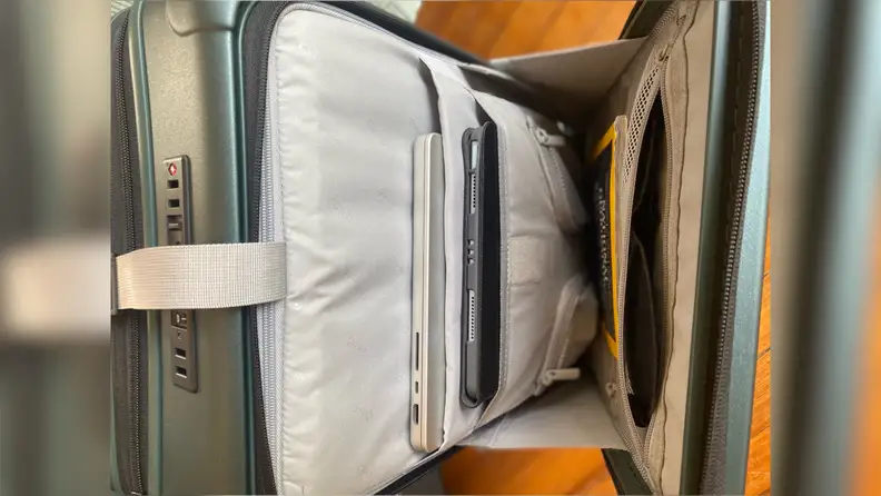 Interior view of larger Coolife luggage to show laptop sleeve.