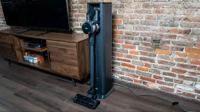 The LG Cordzero A949KTMS in its charging station.