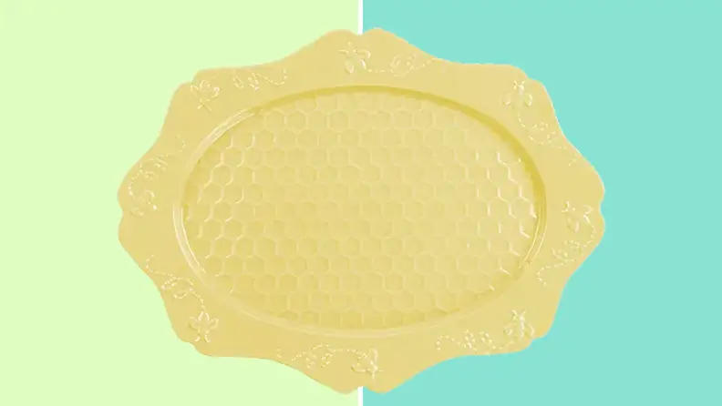 Yellow platter on a blue and green background