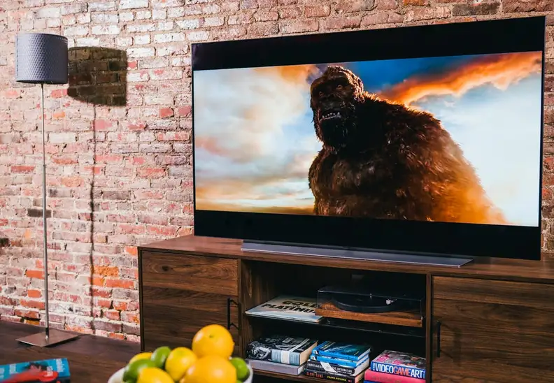 A TV on a console in a living room