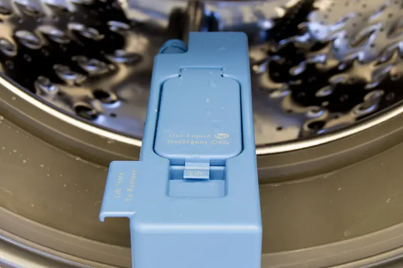 The auto-dispenser can hold up to 12 loads of detergent.