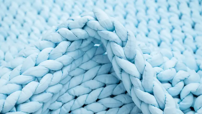 the knit texture of the nuzzie in detail