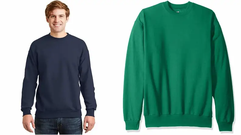 Man wearing black crewneck sweatshirt from Hanes, close-up of green Hanes sweatshirt.