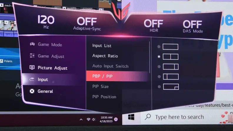 Close-up image of an ultrawide monitor screen with picture-by-picture (PIP)/picture-in-picture (PIP) modes selected on a menu.