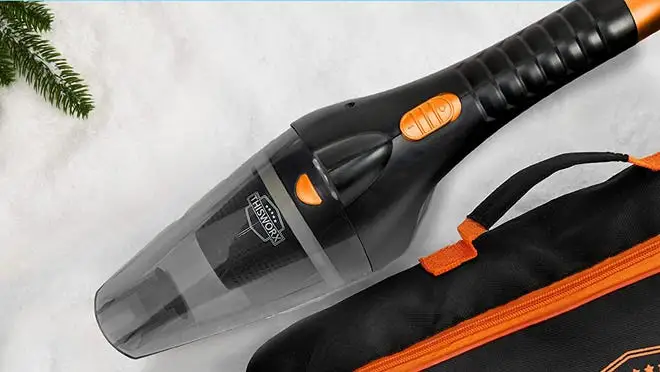Closeup of a portable car vacuum.