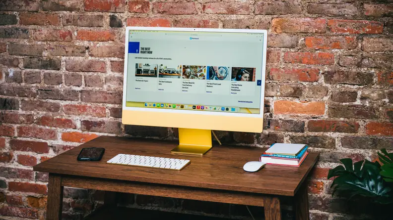 iMac sits on a desk