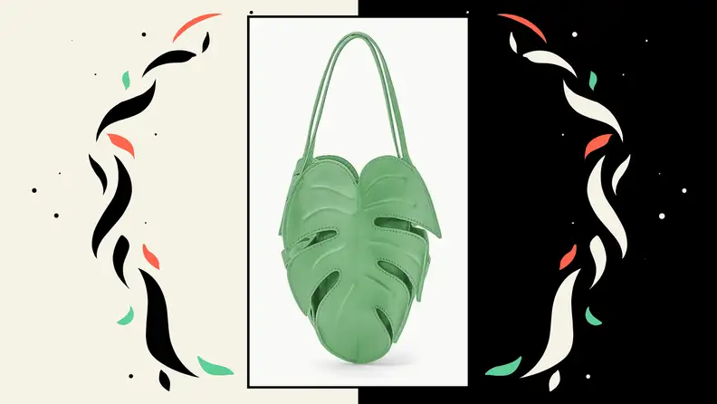 A green leather bag that resembles a palm leaf.