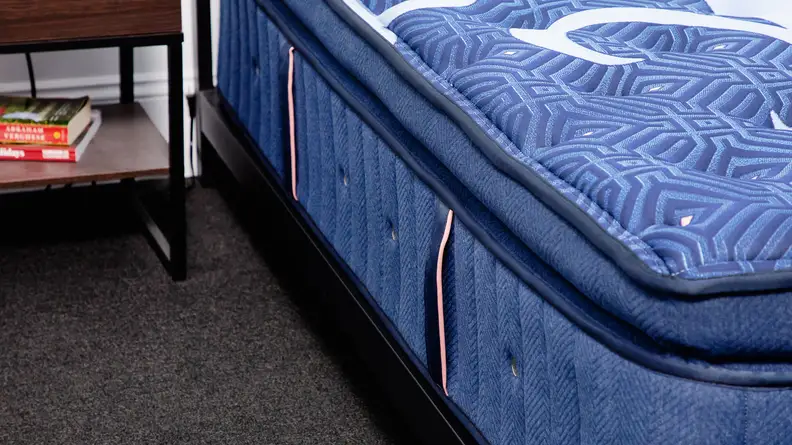 The side of a mattress showing the handles.