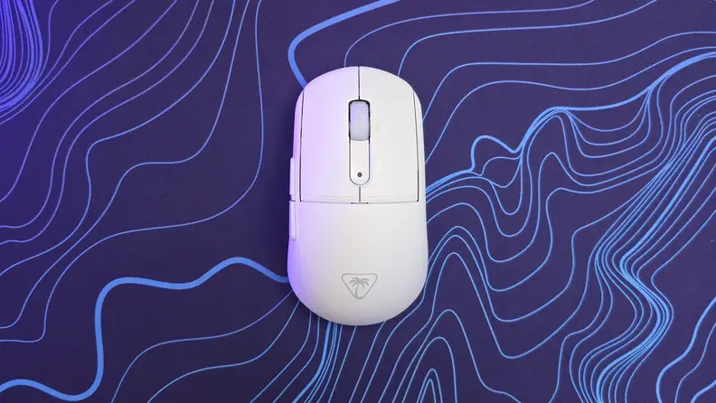 An aerial view of the Turtle Beach Burst II Air mouse on top of a purple and blue patterned mousepad.