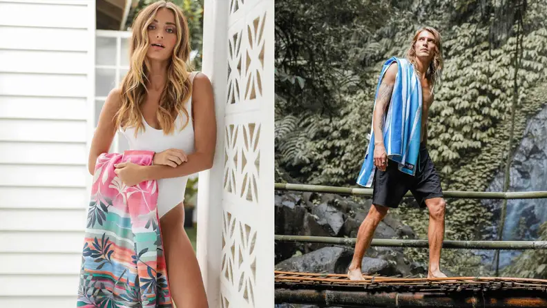 Woman and man with colorful towels draped over them.