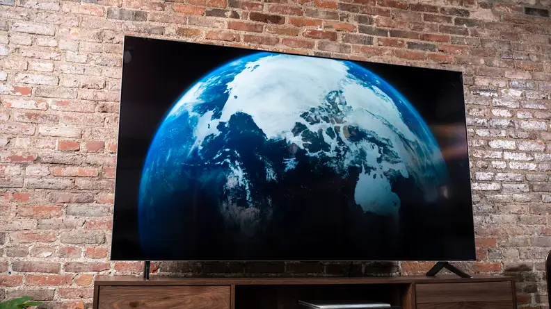 The LG QNED99 8K TV displaying 4K/HDR content in a living room setting