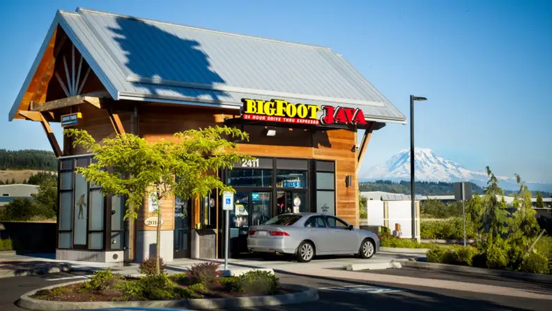 Bigfoot Java drive thru espresso stand with a mountain in the background